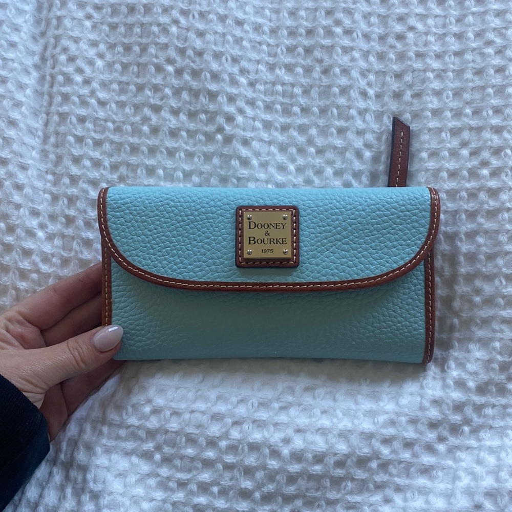 Beautiful light blue wallet never used! In perfect condition